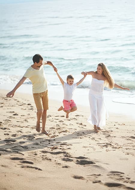 Family enjoying the beach with Get Medical Plan health coverage